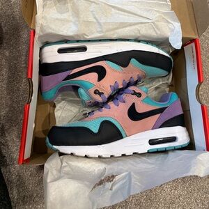 Nike Kids Sneakers in Pink, Purple, and Teal